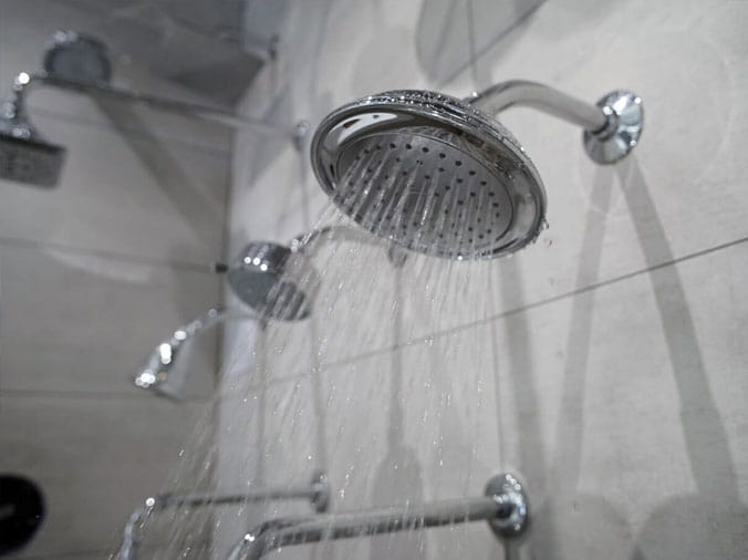 Shower head display in the Green Art Plumbing Supply Showroom